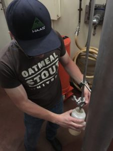Quality Manager Zach Quandt using Zwickel 