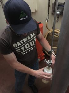 Quality Manager Zach Quandt using Zwickel