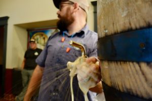 Spray from a Fass keg on Fass Fridays in Summit Ratskeller